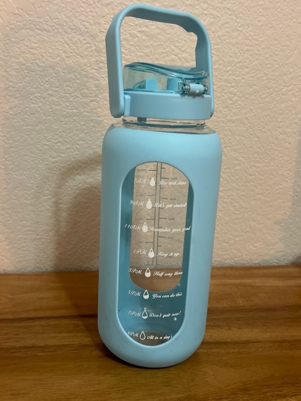 Amazon Light Blue Silicone Sleeve Glass Water Bottle with Handle
